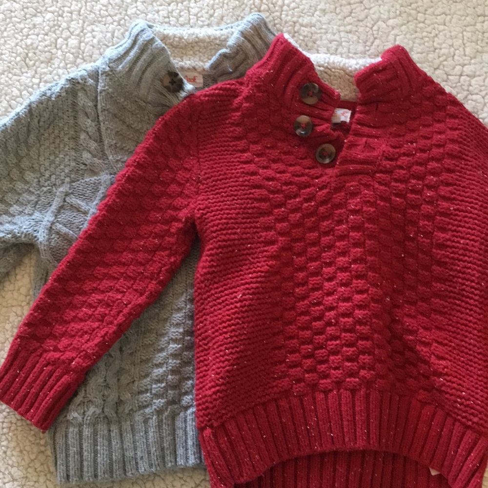 Grey and red pullover sweaters
